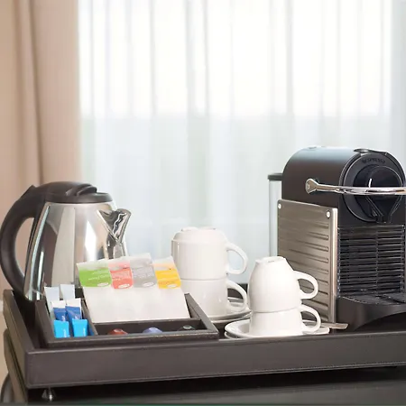 إن إتش شيلر فندق