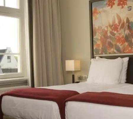 إن إتش شيلر فندق 4*